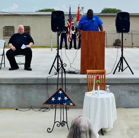 Brookshire Mayor Darrell Branch recognizes veterans at the City of Brookshire Memorial Day remembrance event at the amphitheater on 5th Street. The event was one of several held throughout the Katy area to remember fallen U.S. servicemen and women who died in service to the nation.